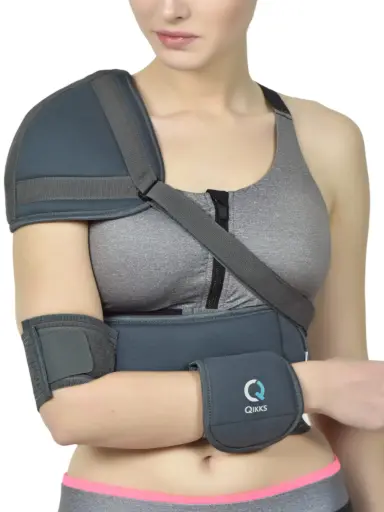 Elastic shoulder support with pad